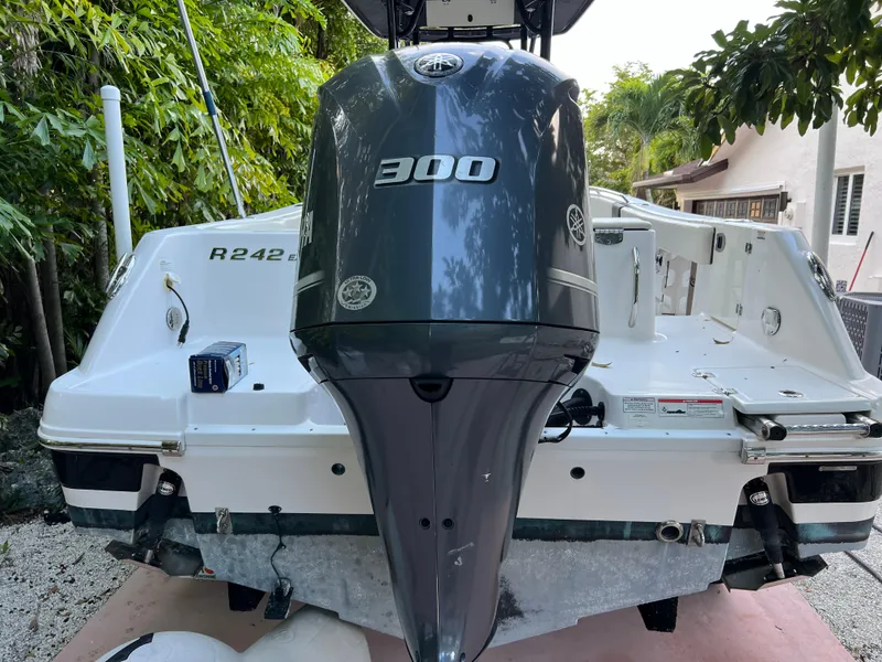 Slide: The Image of 2018 Robalo R242 Center Console boat with 300 HP outboard motor. - 12