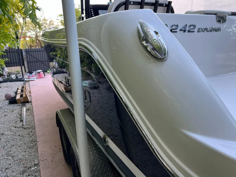 Slide: The Image of 2018 Robalo R242 Center Console boat on trailer, side view. - 17
