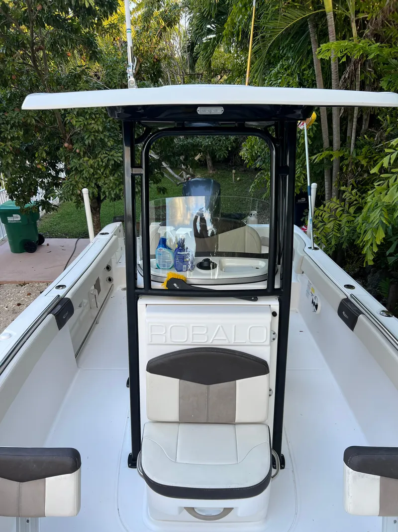 Slide: The Image of 2018 Robalo R242 Center Console boat with seating and storage. - 39