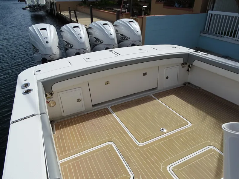 Slide: The Image of 2022 Regulator 41 boat deck with four powerful outboard engines. - 12