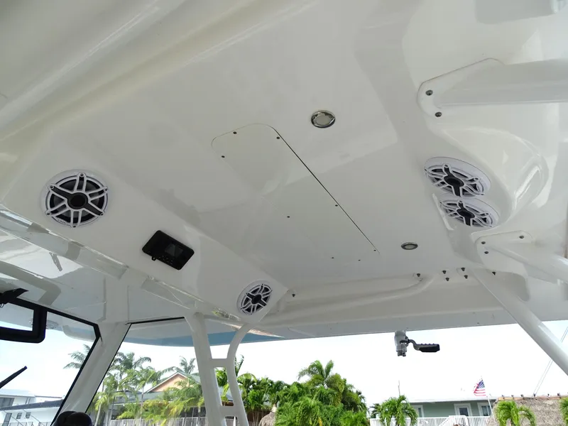Slide: The Image of 2022 Regulator 41 boat interior ceiling with speakers and lighting. - 23