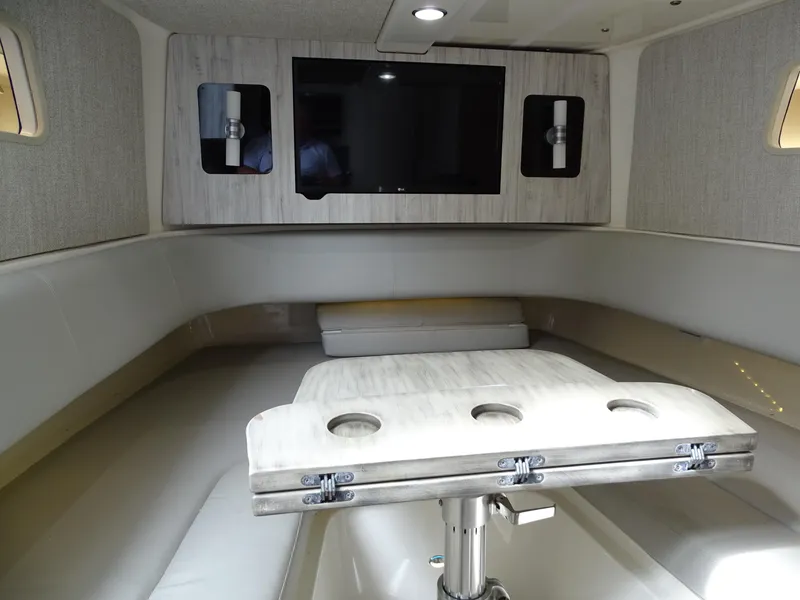 Slide: The Image of Luxurious interior of 2022 Regulator 41 boat with TV and seating area. - 34