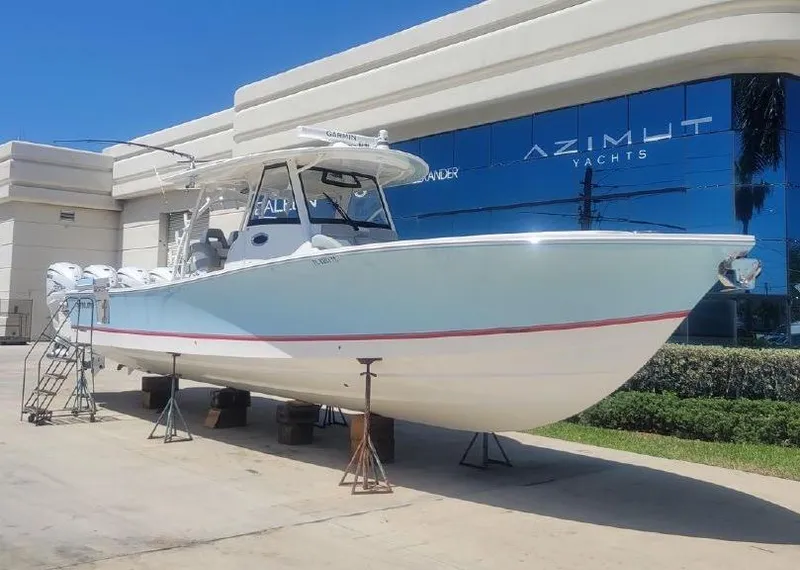 Slide: The Image of 2022 Regulator 41 boat displayed outside Azimut Yachts showroom. - 40