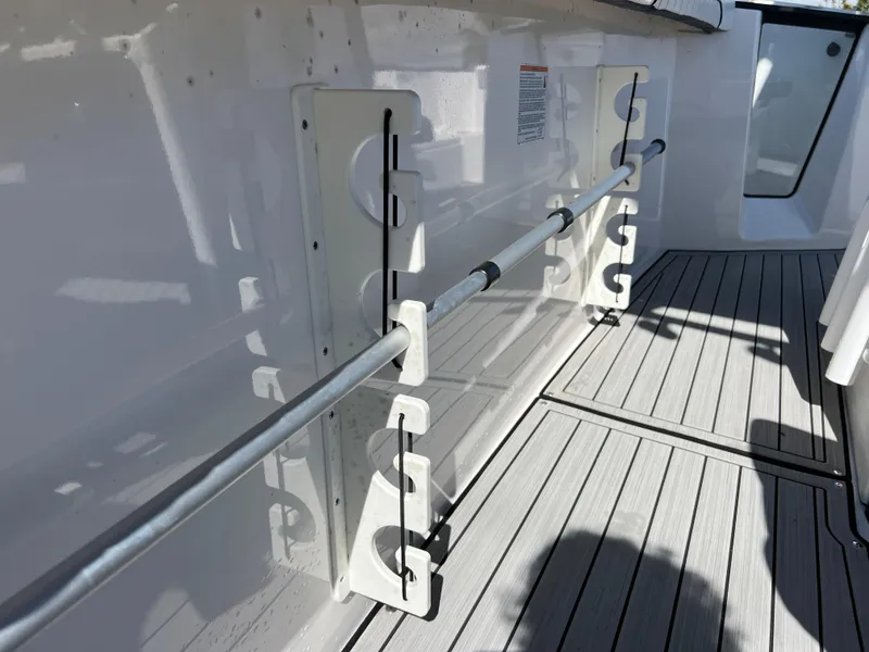 Slide: The Image of Yamaha Boats 2021 FSH 255 Sport E rod holders and deck view. - 10