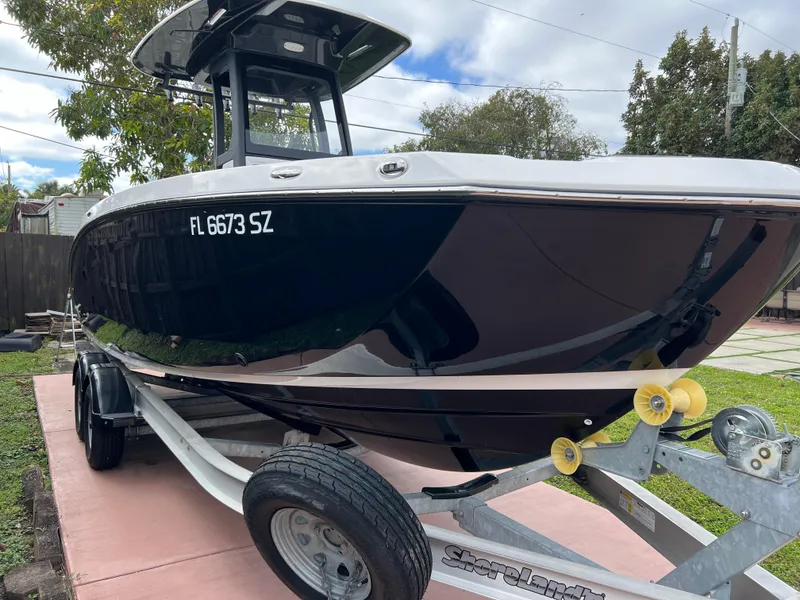Slide: The Image of 2021 Yamaha Boats FSH 255 Sport E on trailer, side view. - 33