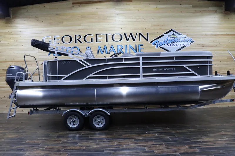Slide: The Image of 2024 Bennington 22SVL pontoon boat at Georgetown Auto & Marine showroom. - 1