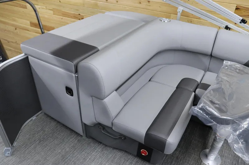 Slide: The Image of 2024 Bennington 22SVL pontoon boat with gray and black seating. - 14