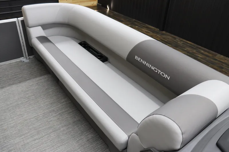 Slide: The Image of 2024 Bennington 22SVL boat interior with gray and white seating. - 25