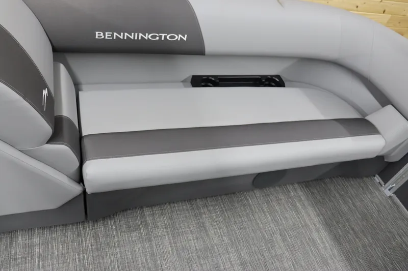 Slide: The Image of 2024 Bennington 22SVL boat interior seating with gray upholstery. - 27
