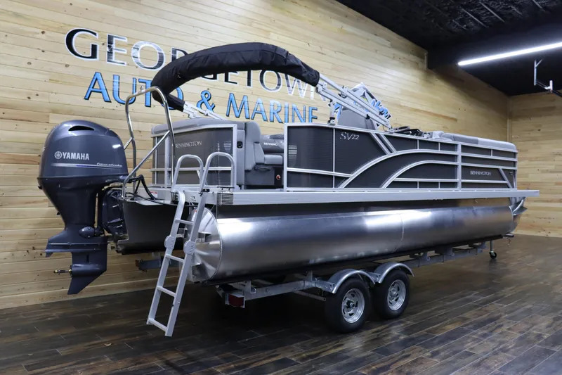 Slide: The Image of 2024 Bennington 22SVL pontoon boat with Yamaha outboard motor at Georgetown Auto & Marine. - 3