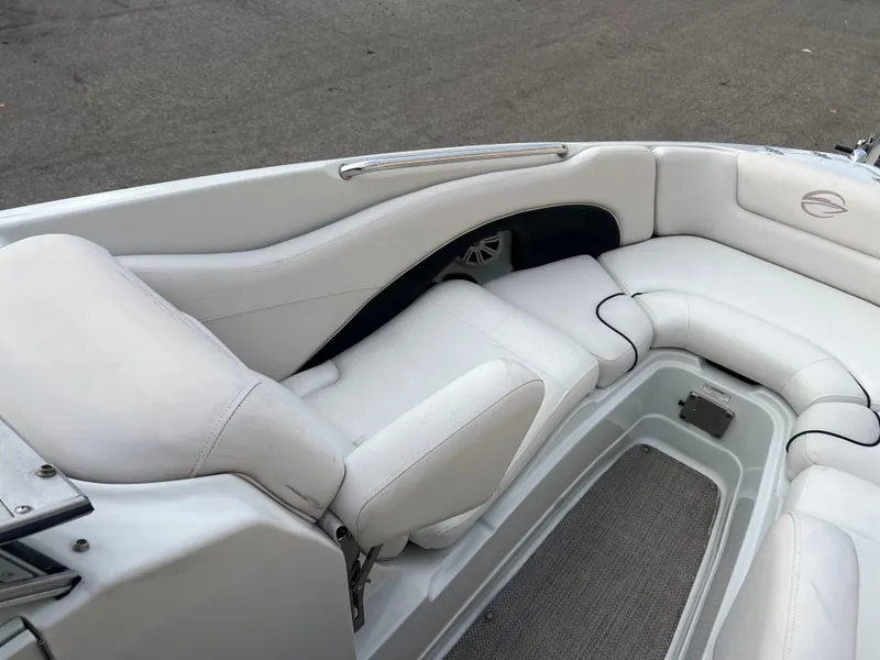 Slide: The Image of 2016 Crownline 270 SS boat interior with white leather seating. - 16