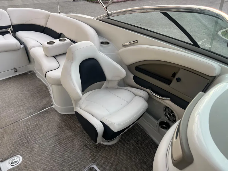 Slide: The Image of 2016 Crownline 270 SS boat interior with white and black seating. - 18