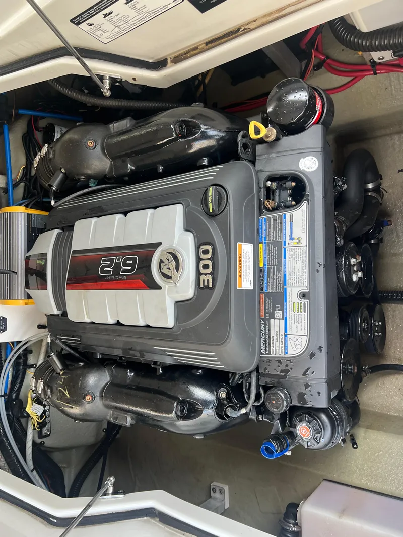 Slide: The Image of 2016 Crownline 270 SS boat engine compartment with 6.2L 300 HP engine. - 22