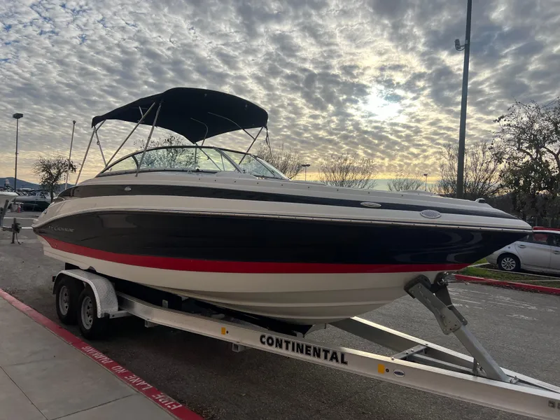 Slide: The Image of 2016 Crownline 270 SS boat on a Continental trailer at sunset. - 28