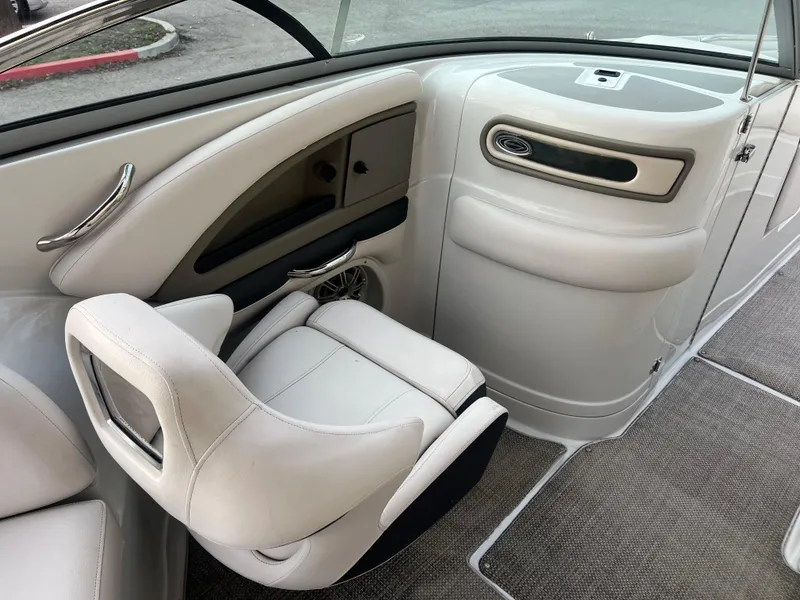 Slide: The Image of Interior of 2016 Crownline 270 SS boat with white seating and modern design. - 35