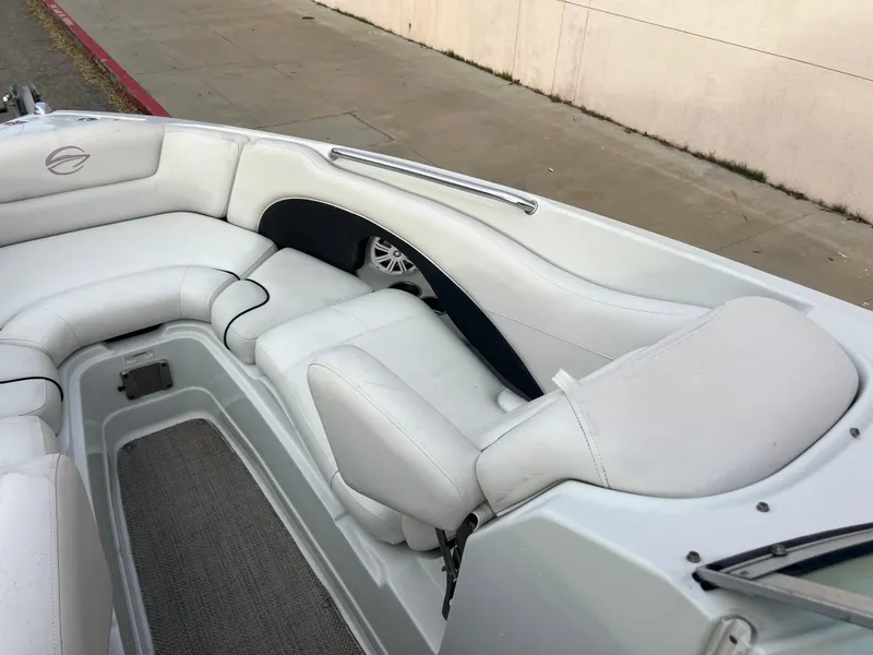 Slide: The Image of 2016 Crownline 270 SS boat interior with white leather seating. - 37