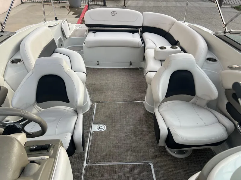 Slide: The Image of 2016 Crownline 270 SS boat interior with white and black seating. - 39