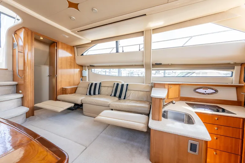 Slide: The Image of Luxurious interior of a 2004 Meridian 459 Motor Yacht with plush seating and modern amenities. - 29