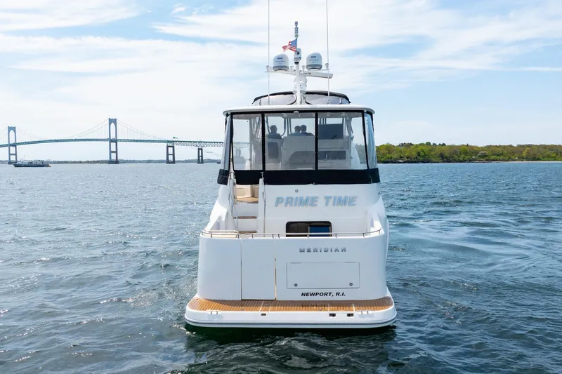 Slide: The Image of 2004 Meridian 459 Motor Yacht on water near Newport, RI, with bridge in background. - 7
