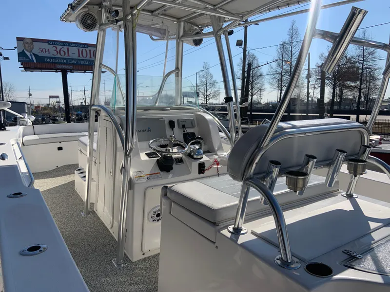 Slide: The Image of 2018 Twin Vee 310 GF boat interior with helm station and seating. - 10