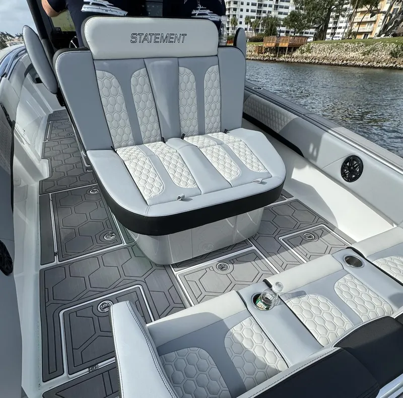 Slide: The Image of Luxury seating on the 2024 Statement 350 boat, featuring stylish upholstery and modern design. - 9