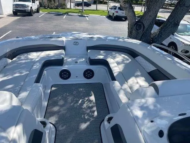 Slide: The Image of 2024 Hurricane 218 SS boat interior with seating and speakers. - 12