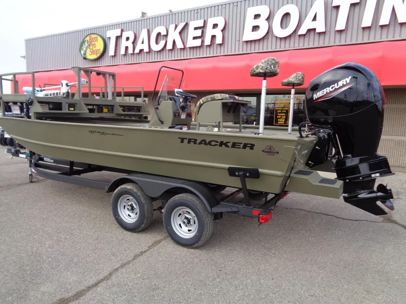 Slide: The Image of 2024 Tracker Grizzly 2072 CC Sportsman boat with Mercury engine at Tracker Boating Center. - 2