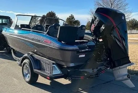 Slide: The Image of 2024 Ranger 1880MS boat with outboard motor on trailer. - 1
