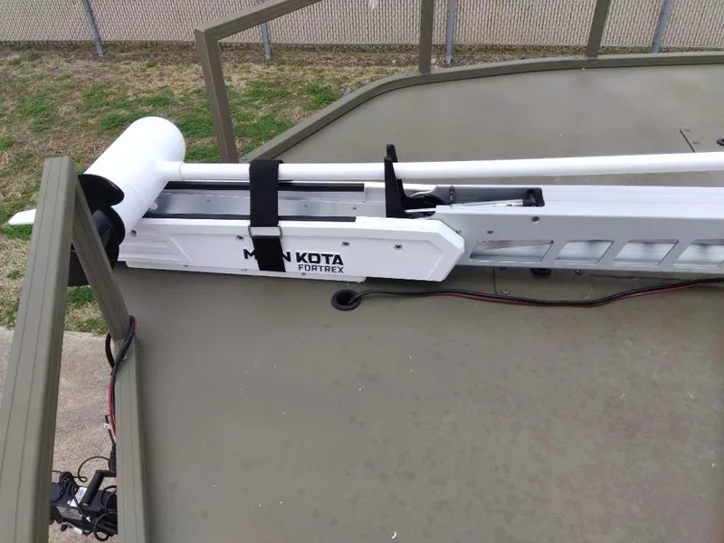 Slide: The Image of Minn Kota Fortrex trolling motor on a 2024 Tracker Grizzly 2072 CC Sportsman boat. - 7