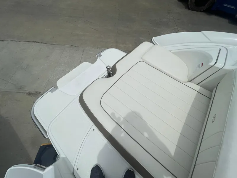 Slide: The Image of 2011 Cobalt 242 boat with white leather seating. - 37