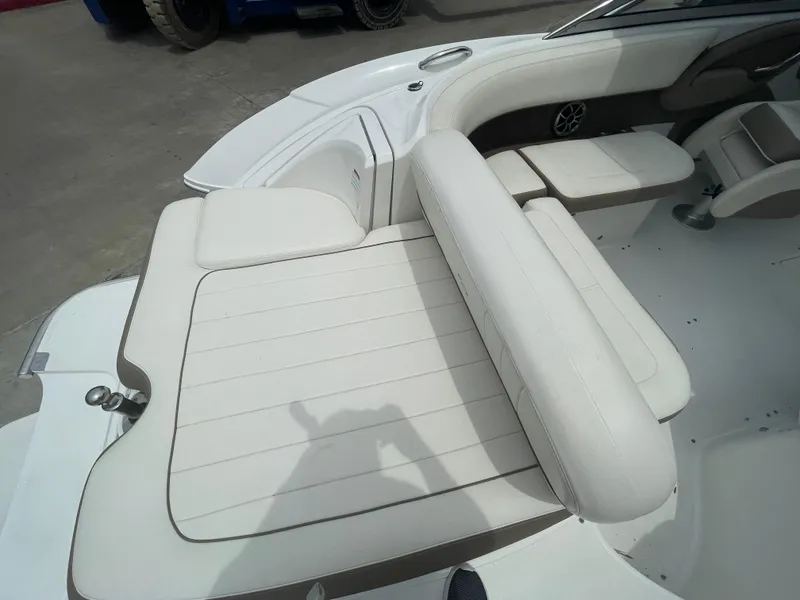 Slide: The Image of 2011 Cobalt 242 boat with white leather seating. - 38