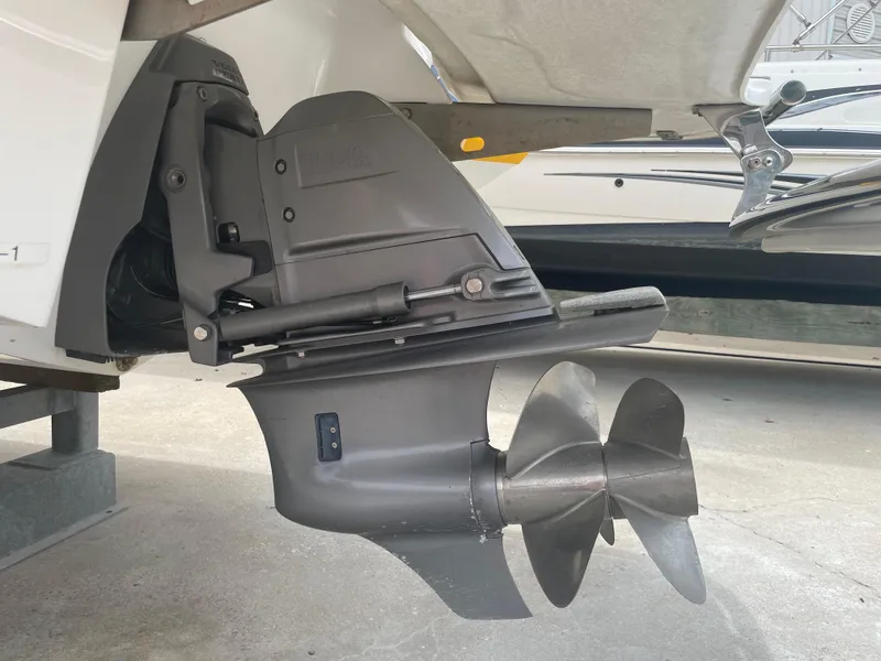 Slide: The Image of Close-up of 2011 Cobalt 242 boat's propeller and stern drive. - 45