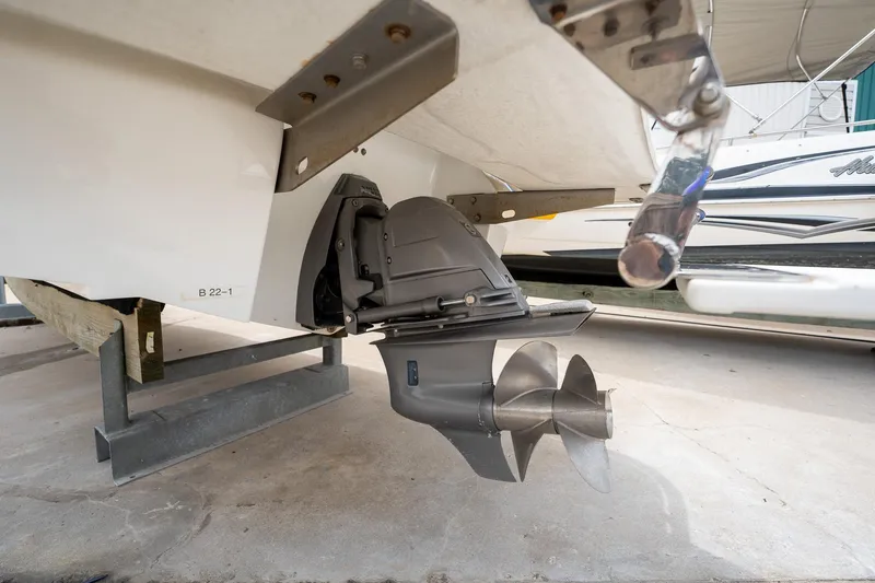 Slide: The Image of 2011 Cobalt 242 boat stern drive and propeller in dry dock. - 7