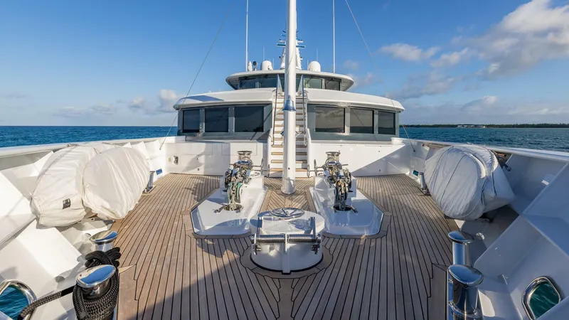 Slide: The Image of Luxurious 2003 Feadship 51.8M yacht deck with ocean view. - 20
