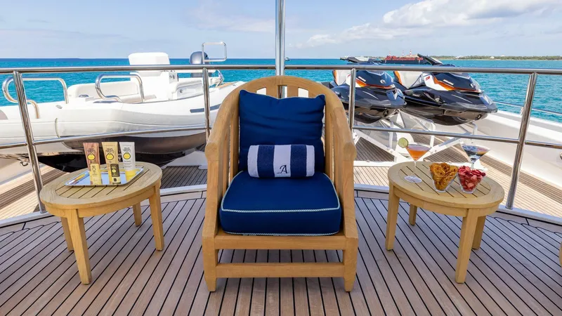 Slide: The Image of Luxury seating area on Feadship 51.8M yacht, 2003 model, with ocean view and refreshments. - 27