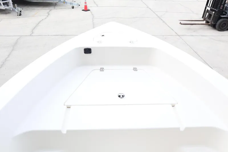 Slide: The Image of Bow view of 2024 Key West 179FS boat with storage compartment. - 6