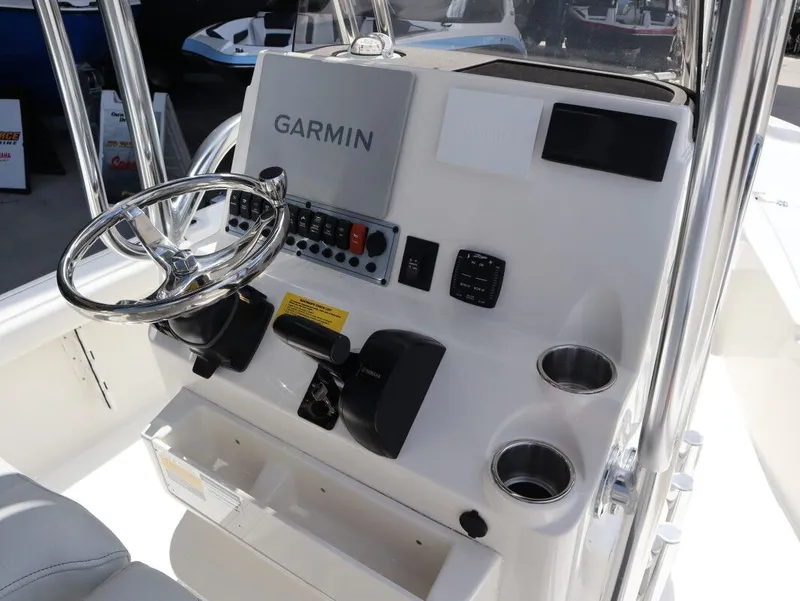 Slide: The Image of Interior view of Key West Bay Reef 230BR boat, model year 2025. - 11