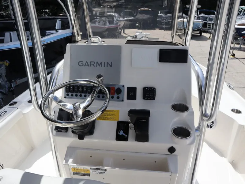 Slide: The Image of Interior view of Key West Bay Reef 230BR boat, model year 2025. - 12