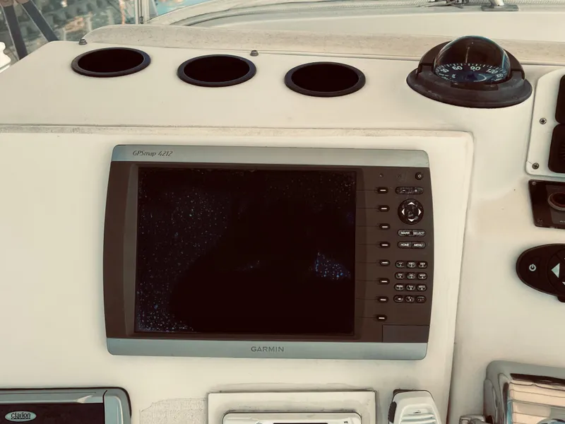 Slide: The Image of Garmin GPSmap 4212 on 1999 Luhrs 360 Sportfish dashboard. - 19