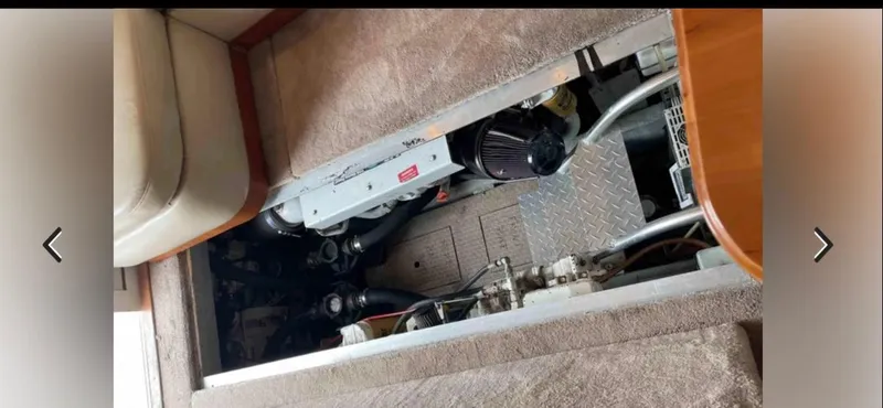 Slide: The Image of Engine compartment of a 1999 Luhrs 360 Sportfish boat. - 36