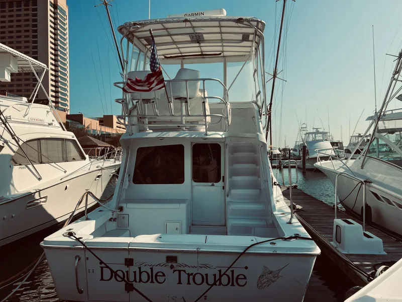 Slide: The Image of 1999 Luhrs 360 Sportfish Double Trouble docked at marina. - 4