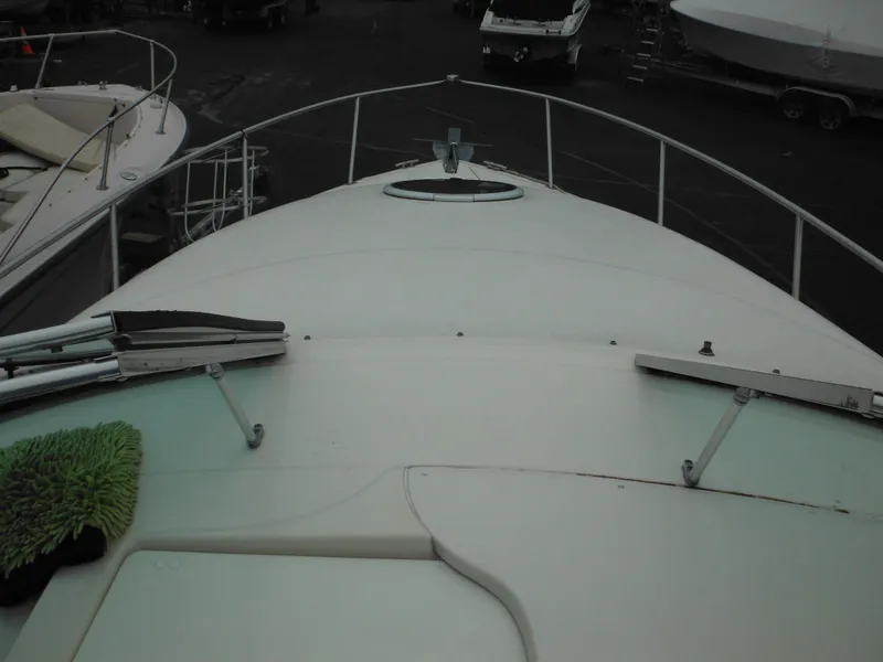 Slide: The Image of 1999 Monterey 262 Cruiser boat deck view in a marina. - 19