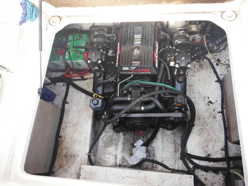 Slide: The Image of 1999 Monterey 262 Cruiser engine compartment with MerCruiser 5.7L engine. - 41