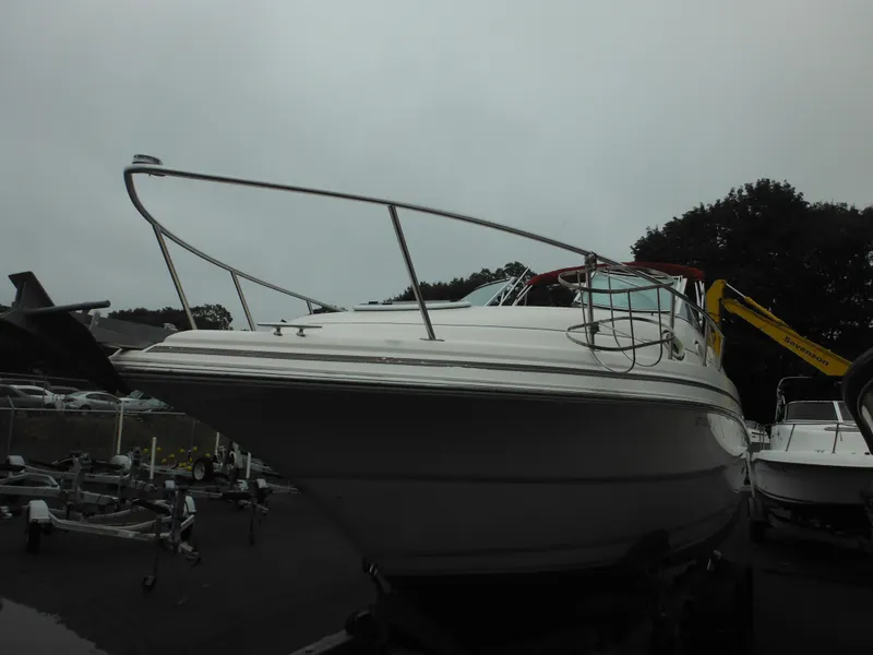 Slide: The Image of 1999 Monterey 262 Cruiser boat on trailer in storage yard. - 6