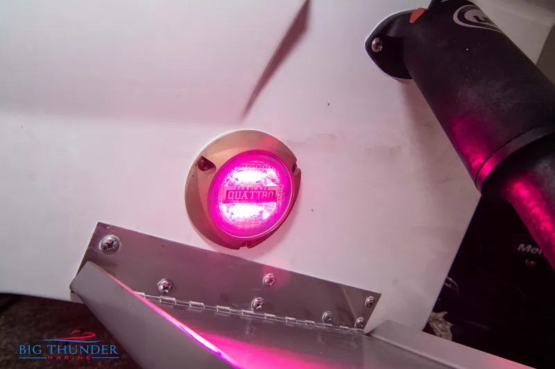 Slide: The Image of Close-up of 2024 Monterey 278 SS boat with illuminated Quattro light. - 10