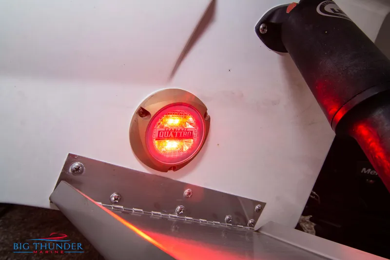 Slide: The Image of Close-up of 2024 Monterey 278 SS boat's illuminated Quattro light. - 11