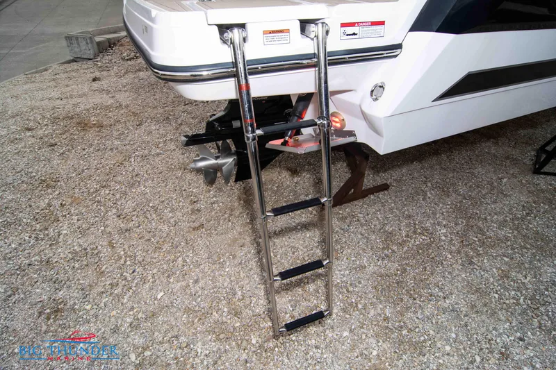 Slide: The Image of 2024 Monterey 278 SS boat with extended swim ladder. - 17