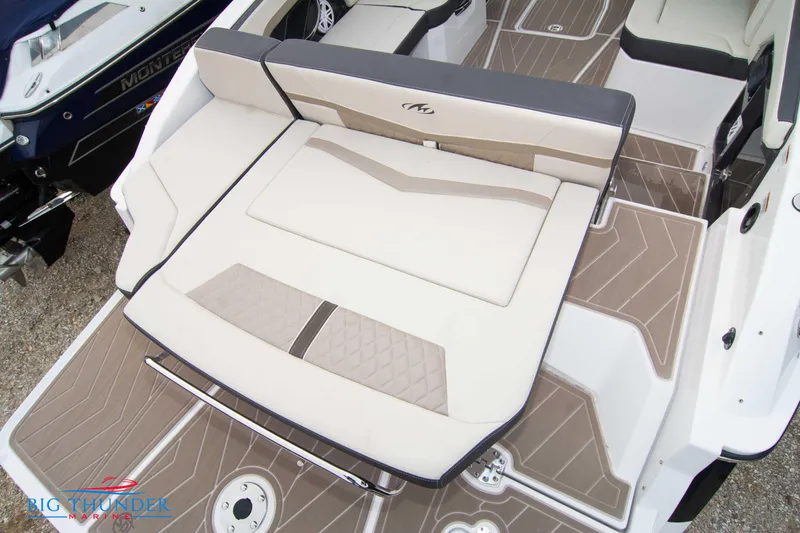 Slide: The Image of 2024 Monterey 278 SS boat with spacious rear seating and modern design. - 18