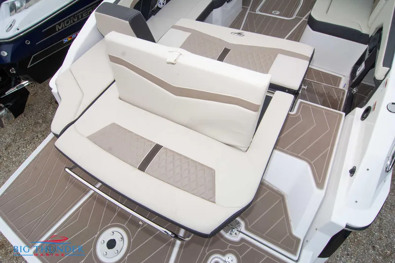 Slide: The Image of 2024 Monterey 278 SS boat with beige and white seating and deck. - 20
