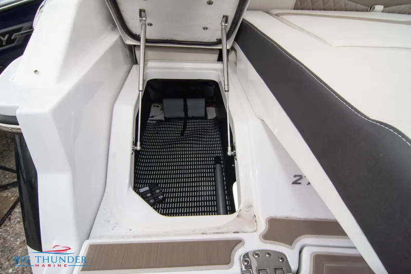 Slide: The Image of 2024 Monterey 278 SS boat storage compartment with open hatch. - 21